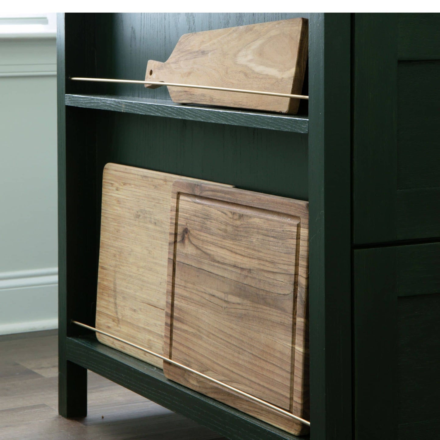 close up of display shelves for cutting boards on DIY kitchen island