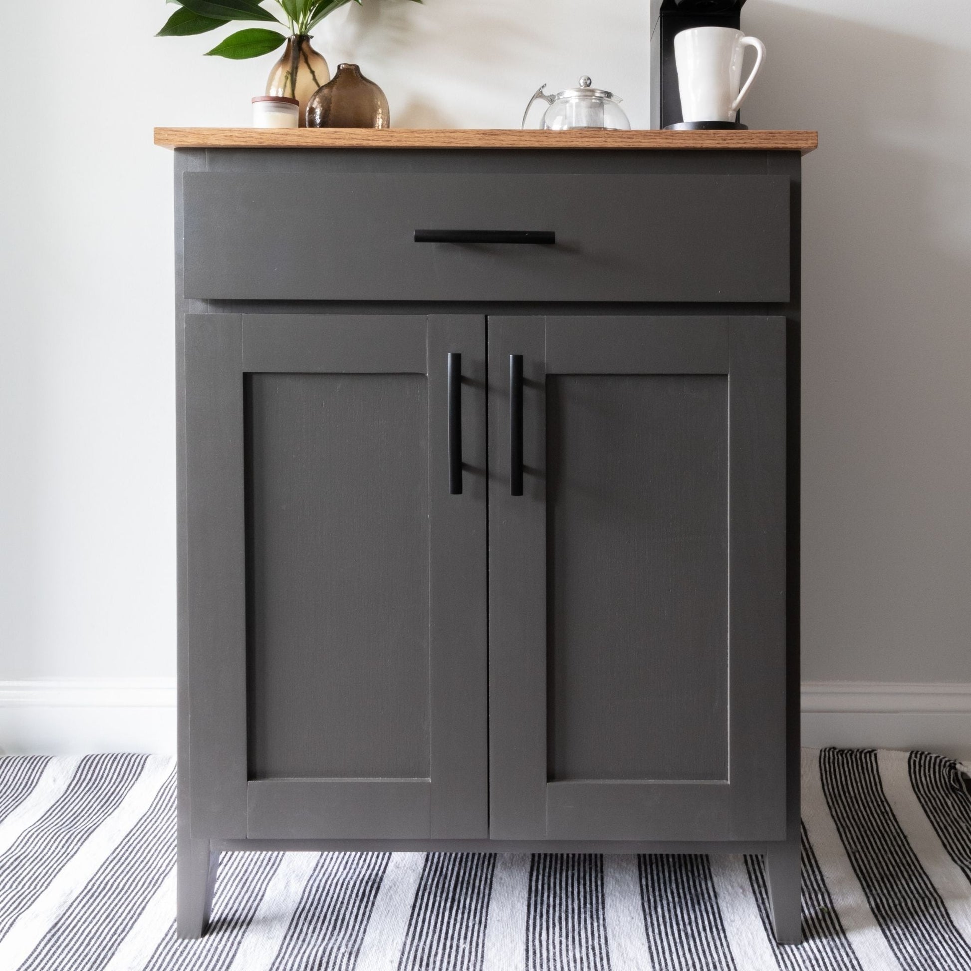 DIY Accent Cabinet Printable Plans with dark gray drawer on striped rug