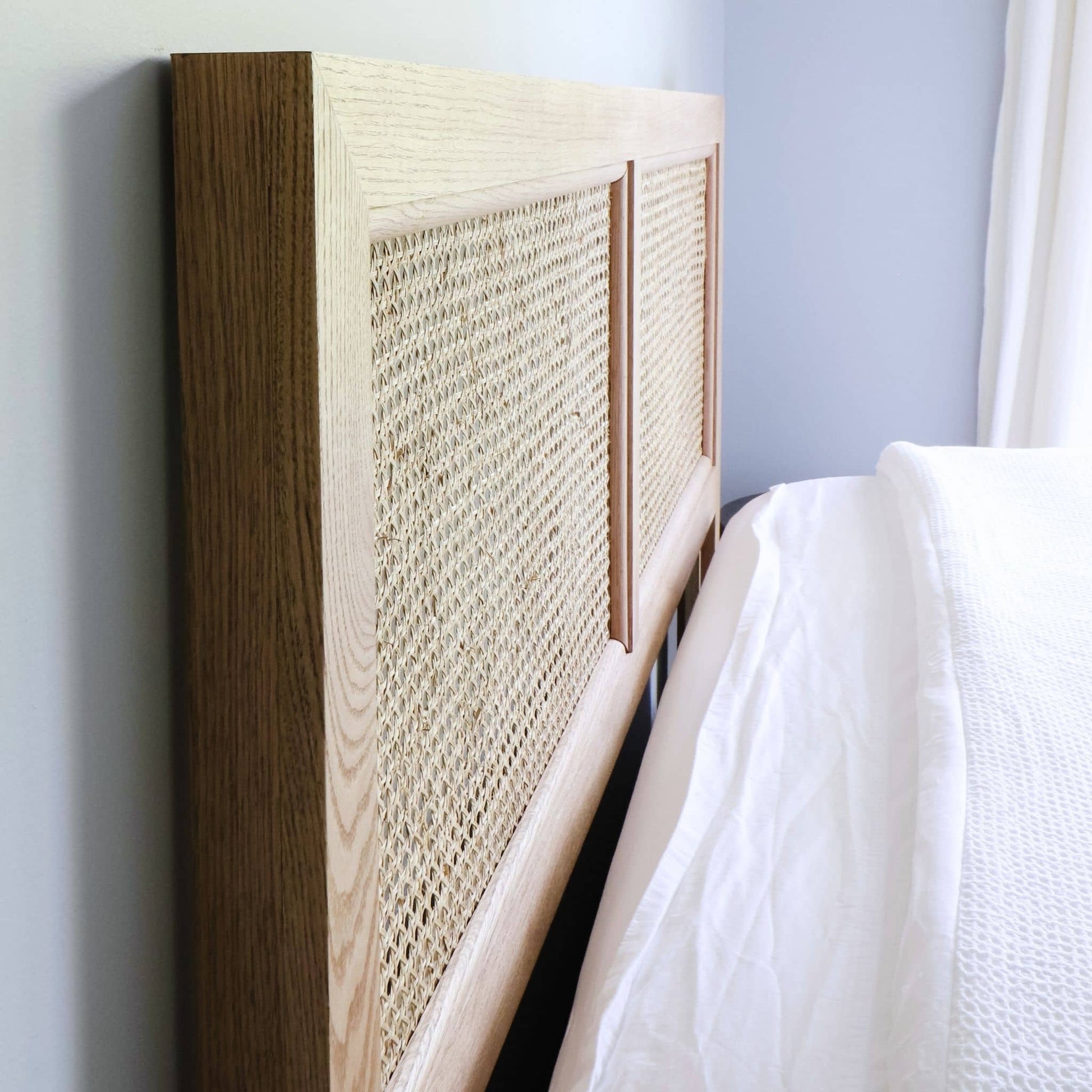 Sideview of Cane Headboard attached to bed