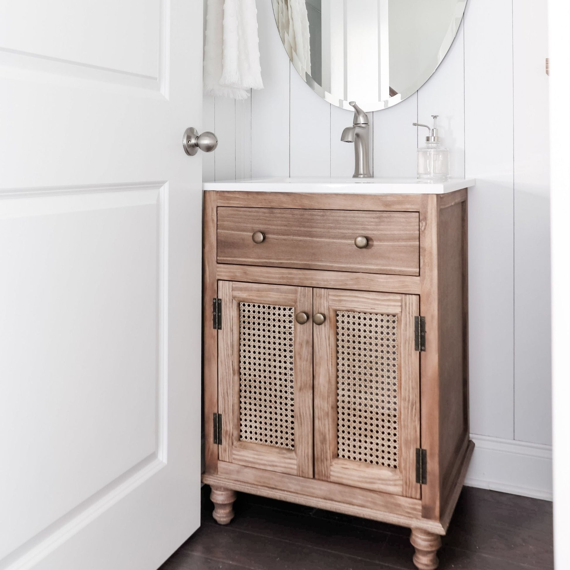 Cane Vanity in a bathroom stained