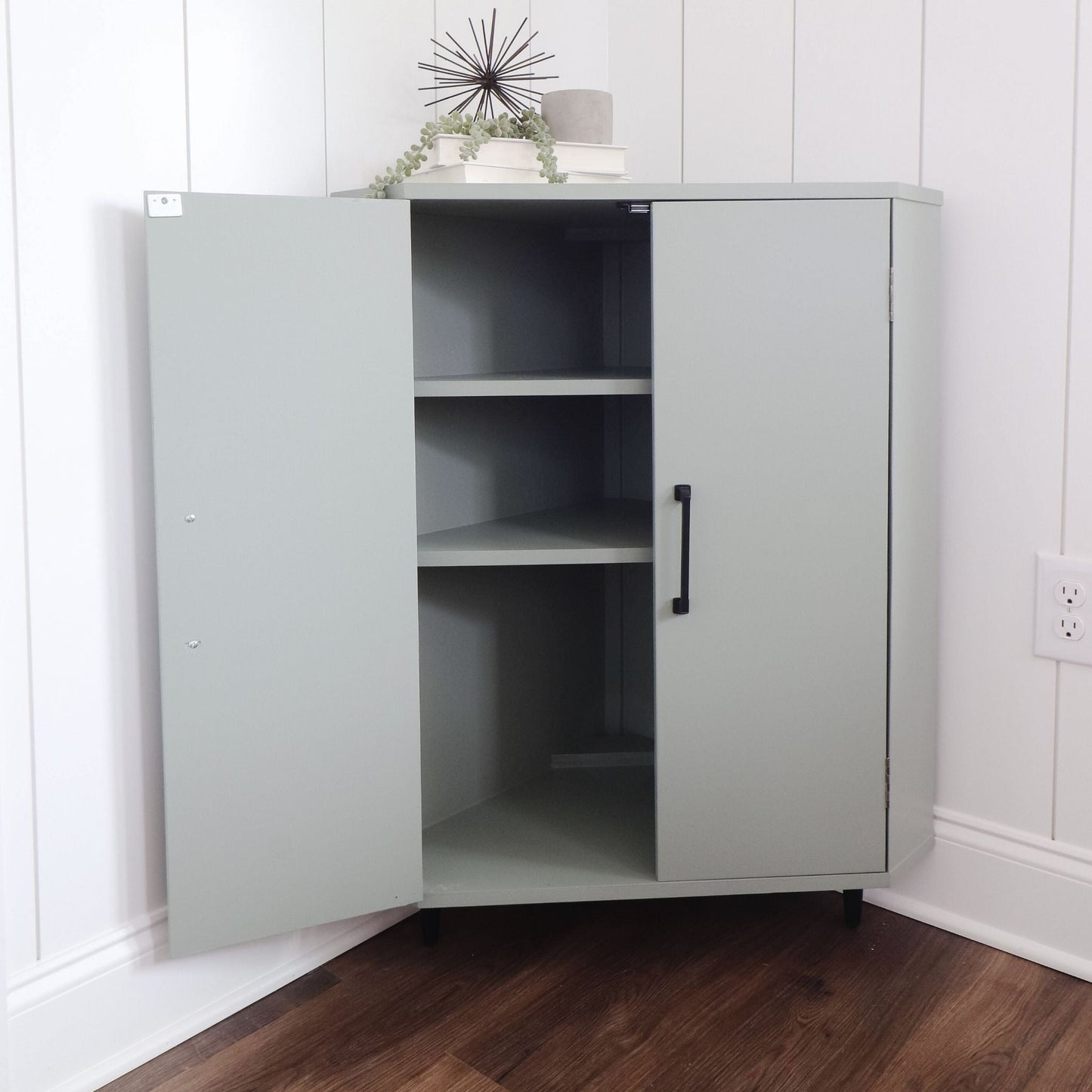 Corner Cabinet painted light green open