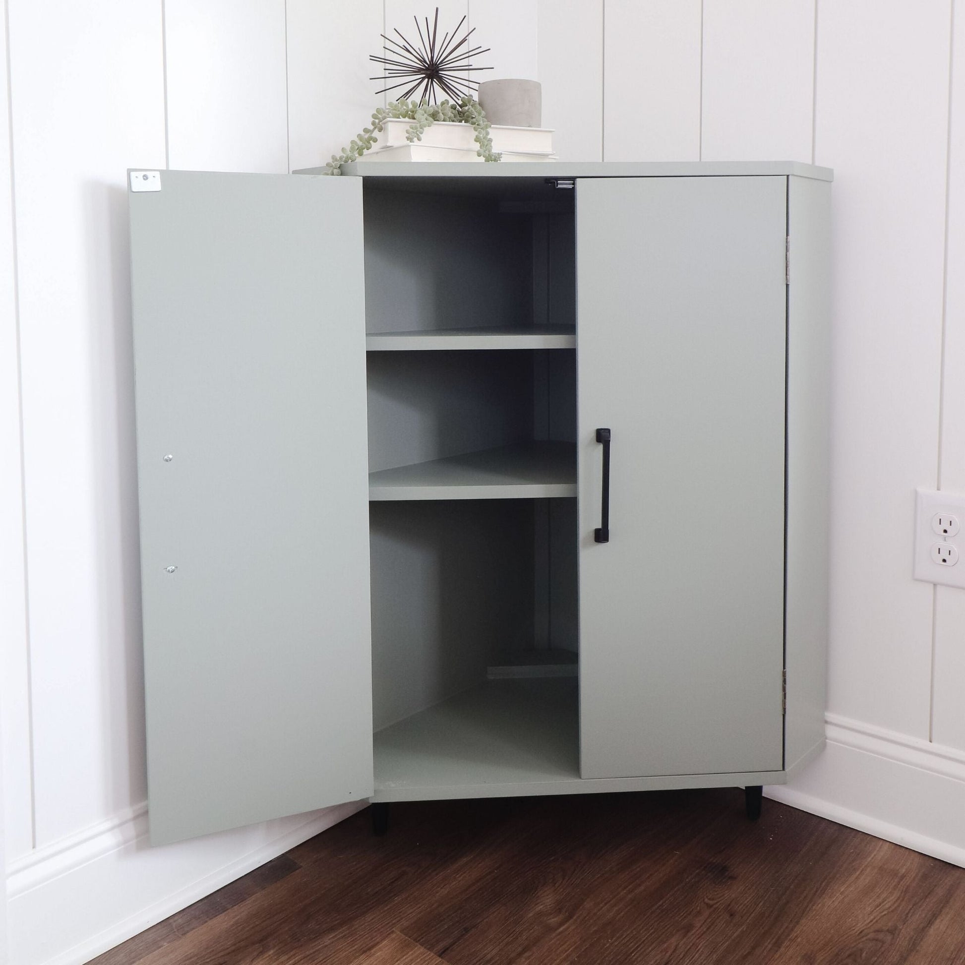 Corner Cabinet painted light green open