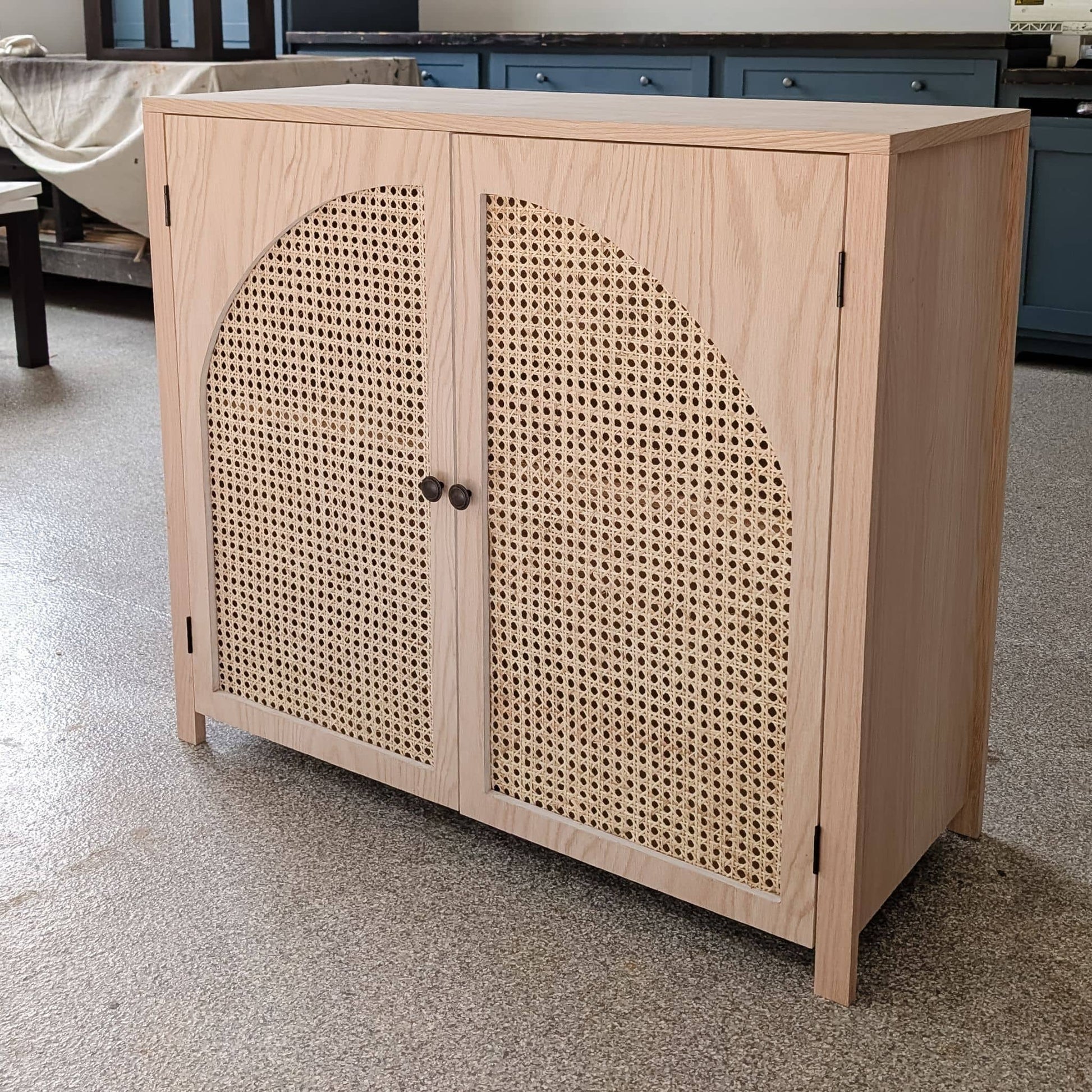 DIY cane door cabinet with arches made from red oak 