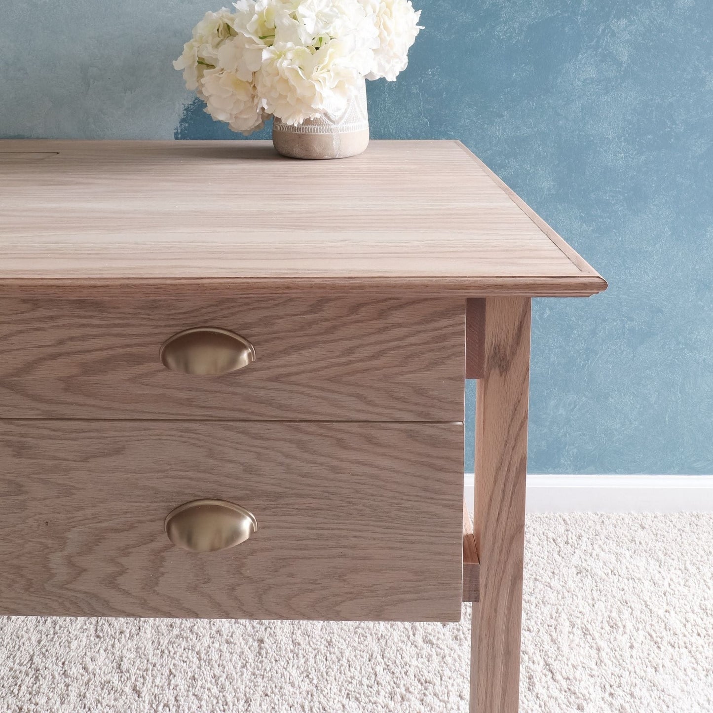 Desk with Drawers close up with gold handles