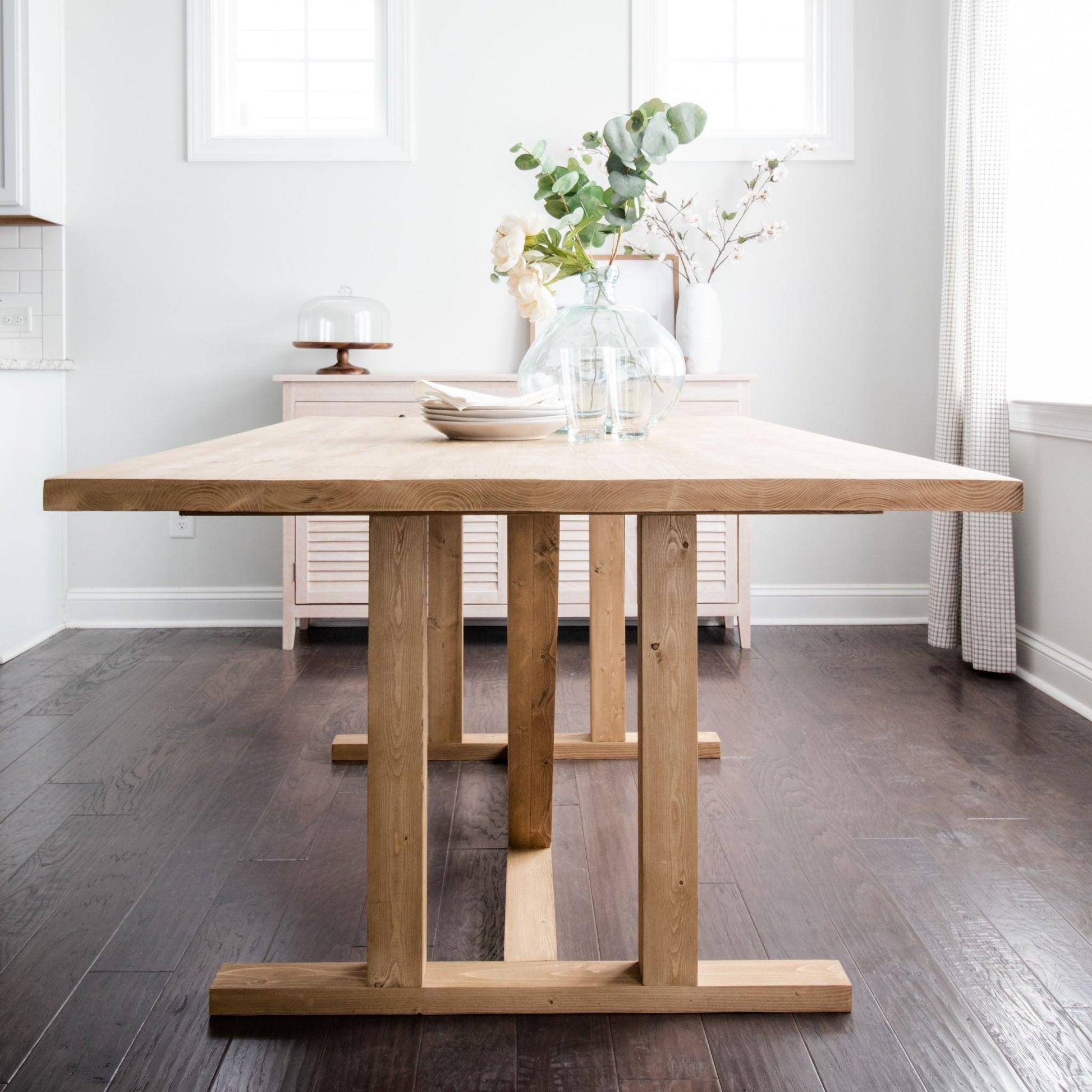 Dining Table inside a dining room unstained