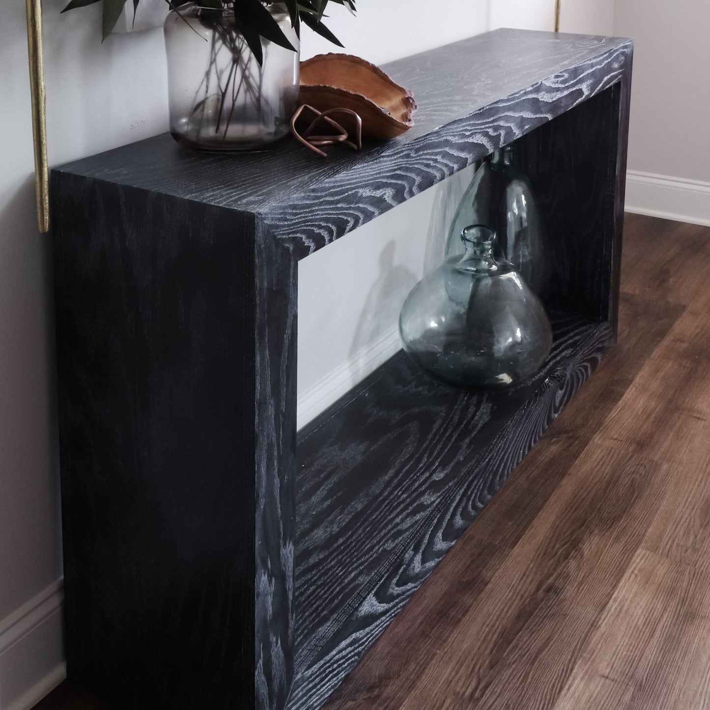 Entry Table stained black and styled