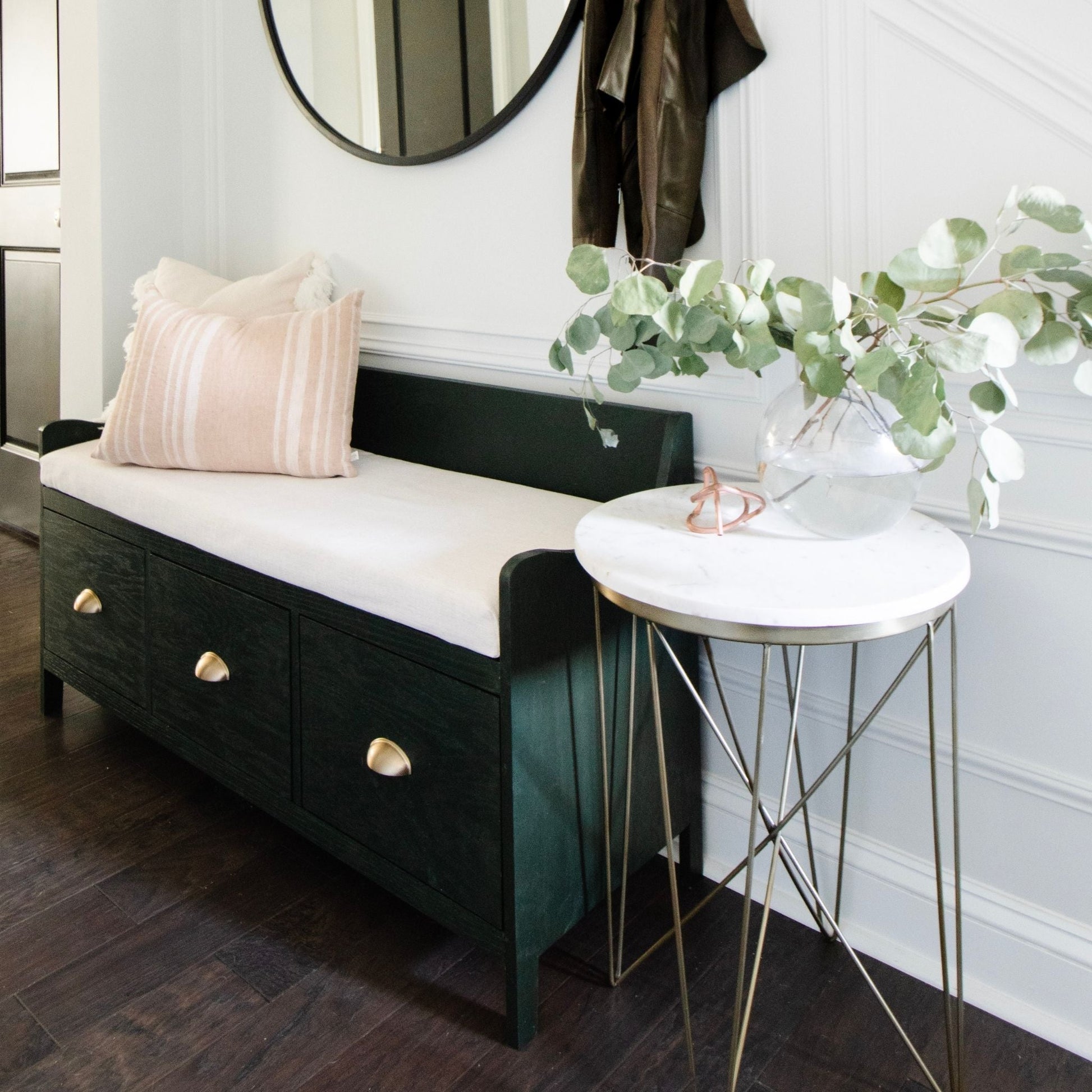 Entryway Bench with Storage stained green and styled in an entryway