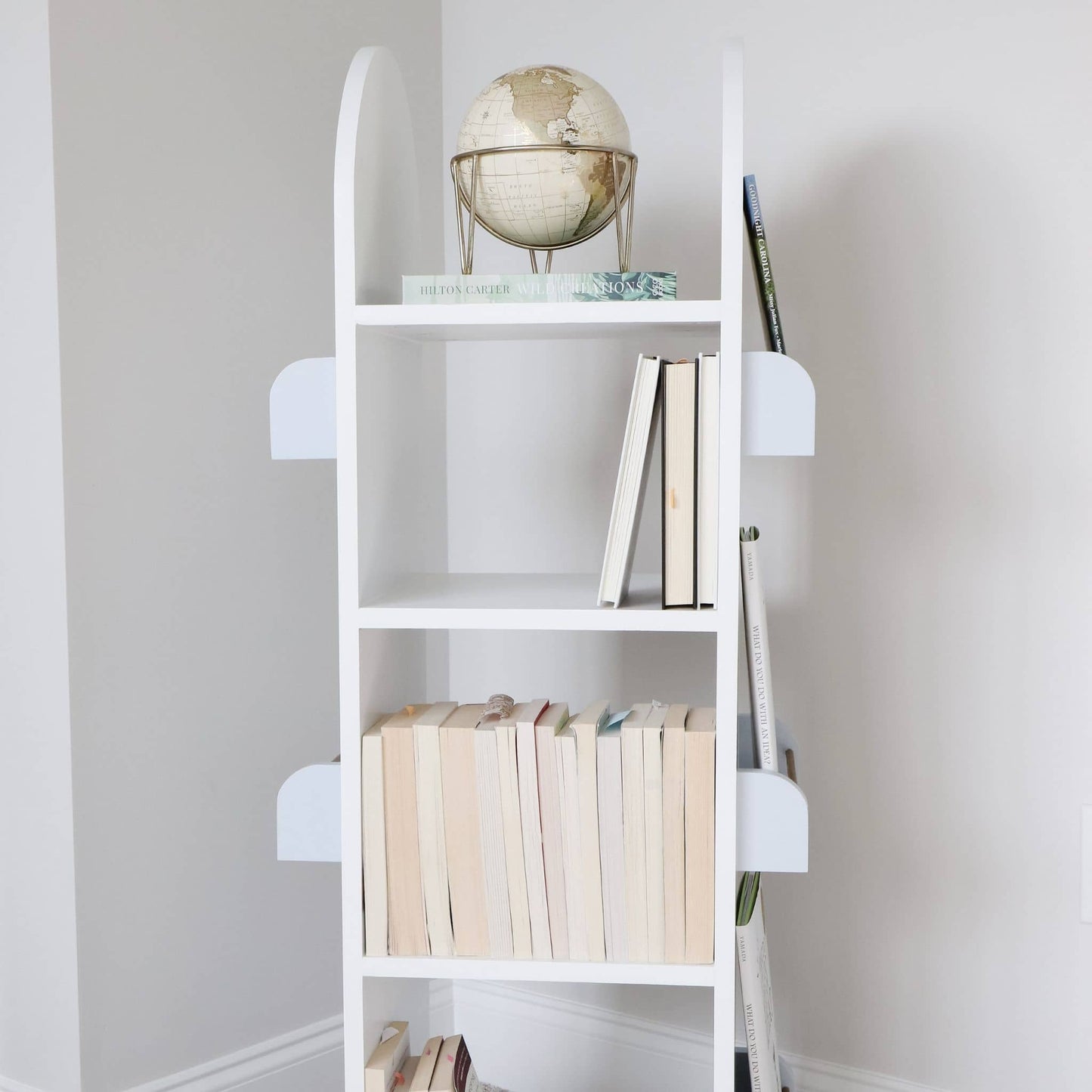 Rotating Bookshelf styled with books