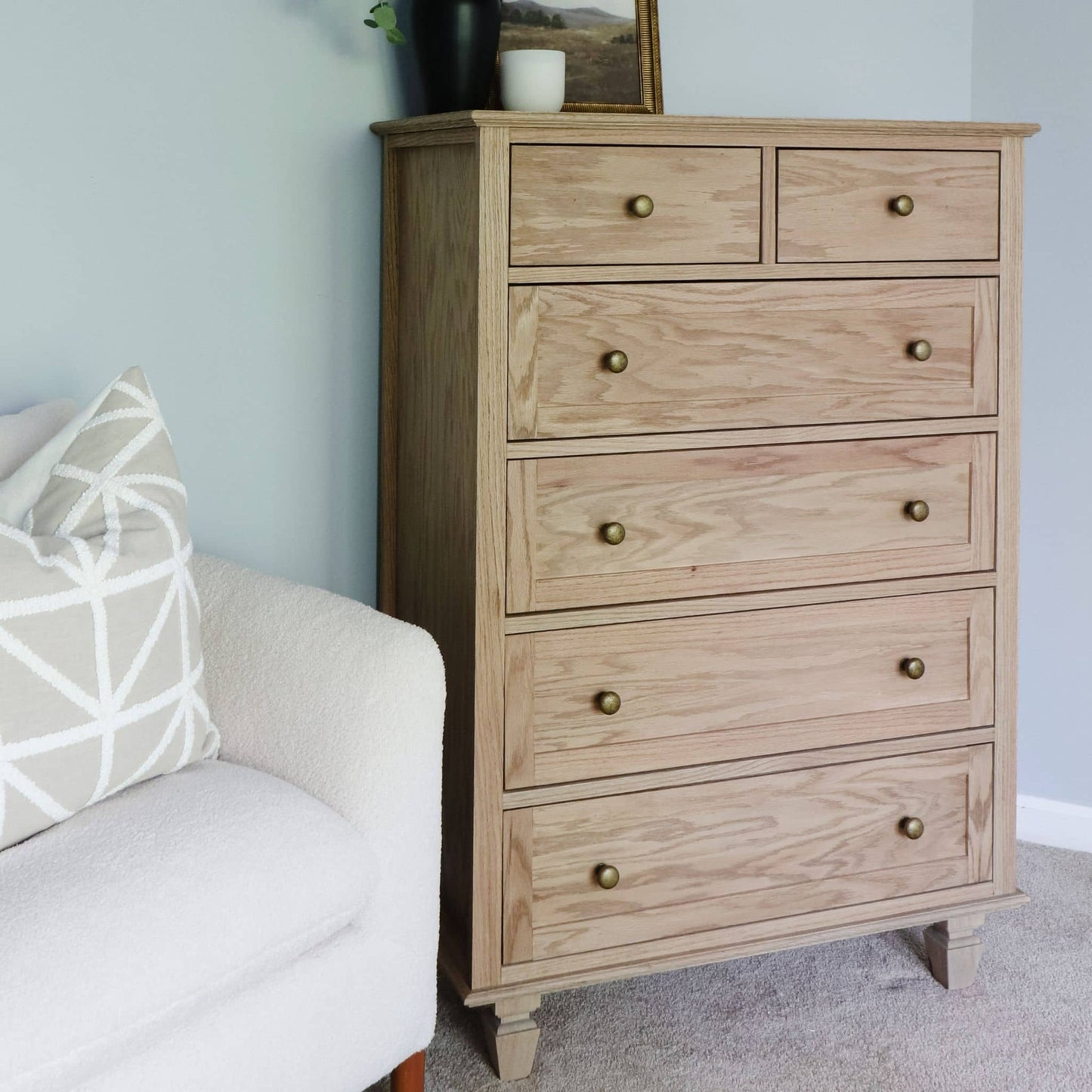 Tall Dresser in bedroom with gold knobs