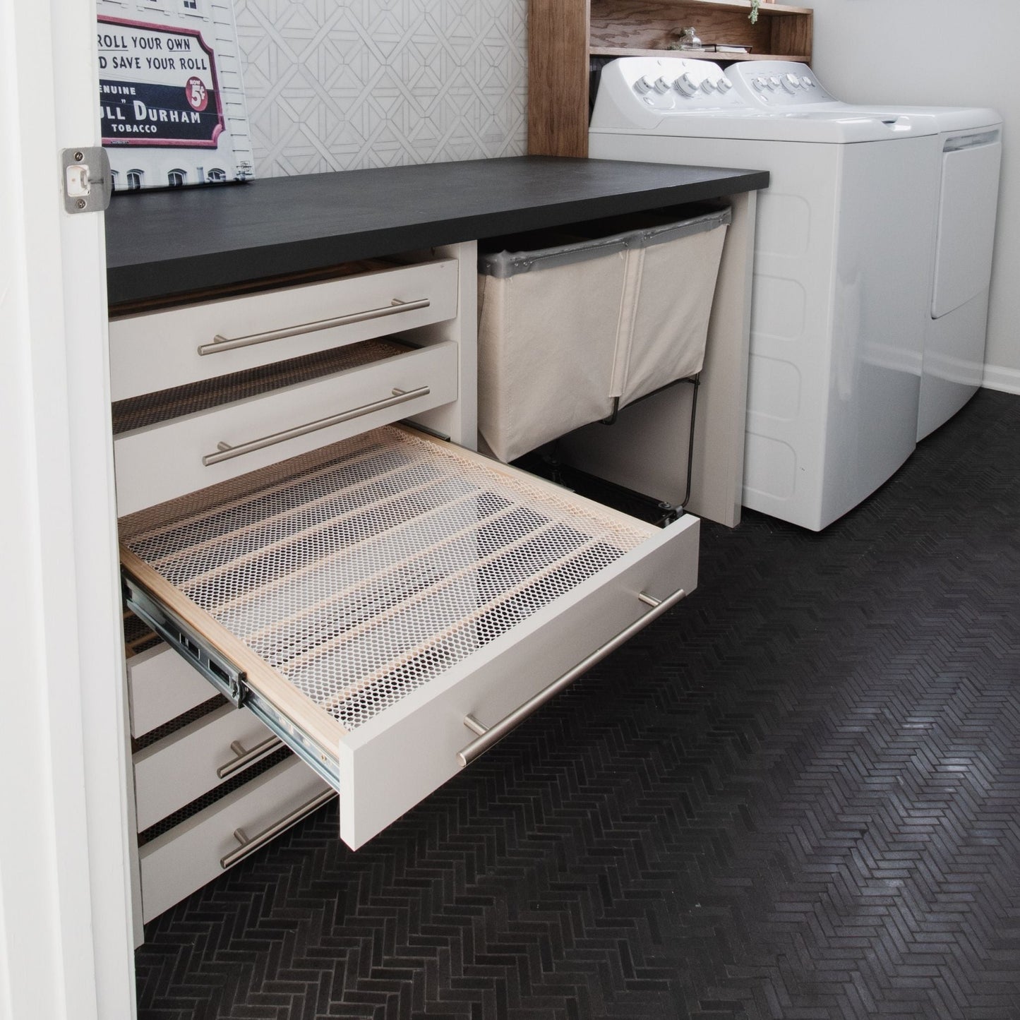 The Ultimate Laundry Folding Station with drying rack drawer pulled out